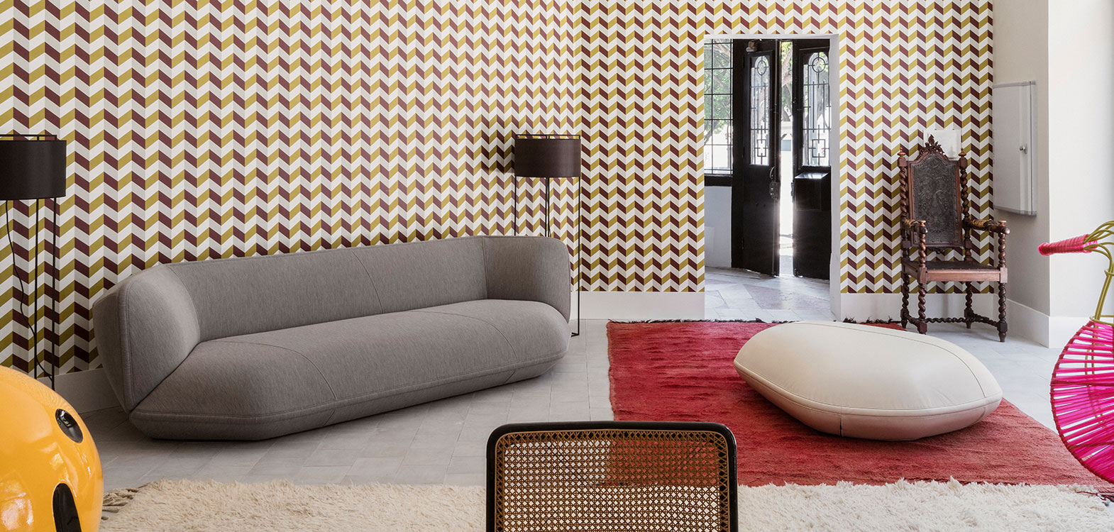 Sitting room with hung work above a low sofa
